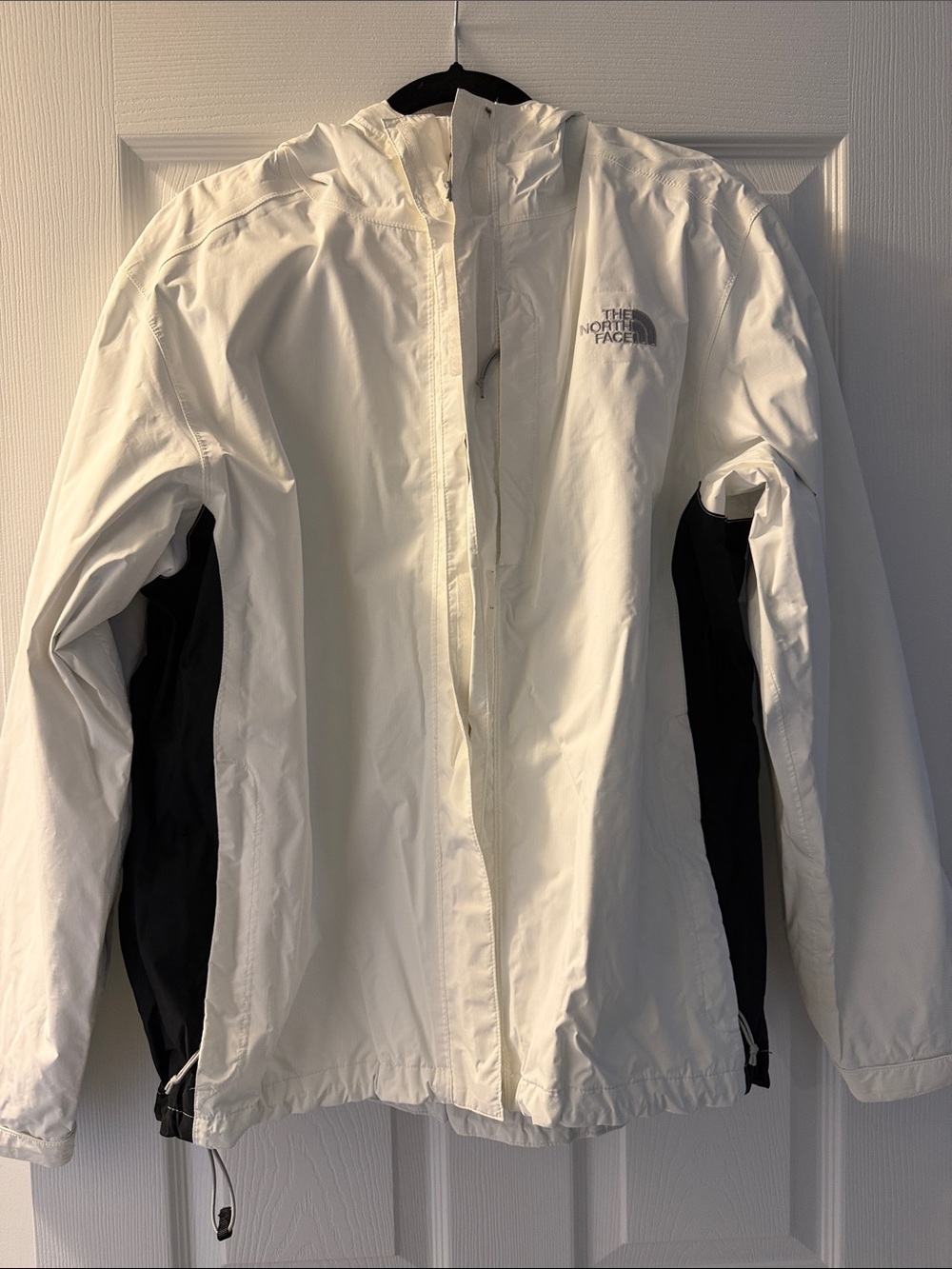 The North Face women’s White Jacket with Black Side Panels